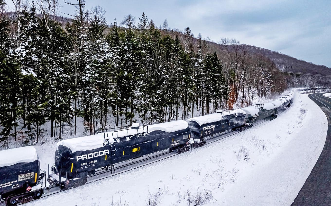 Photo of Procor tank cars in winter snow.