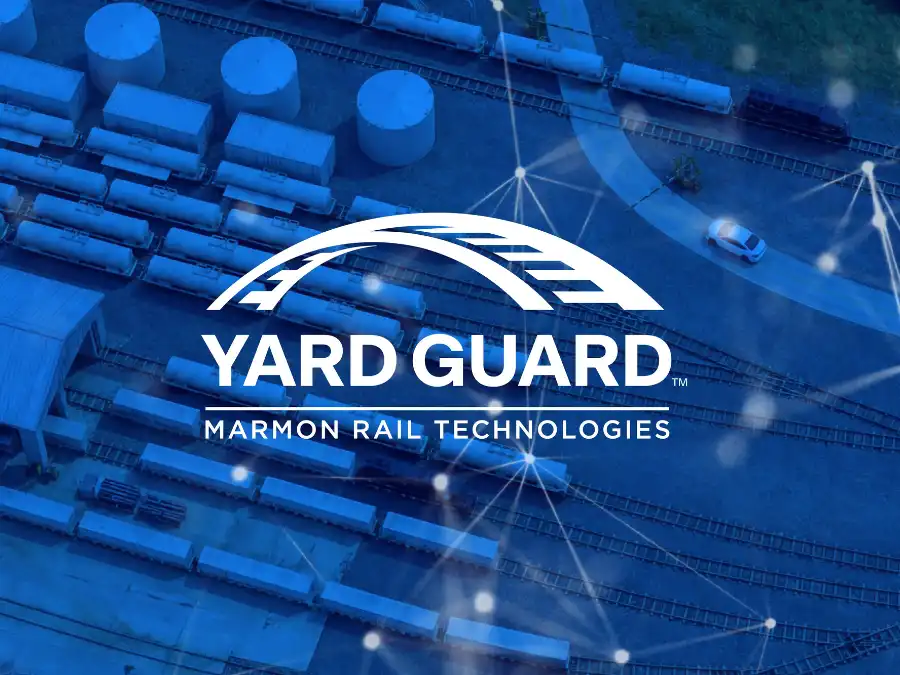 Aerial view of a rail yard with tank cars and a parked vehicle, overlaid with the Yard Guard Marmon Rail Technologies logo and digital network graphics.